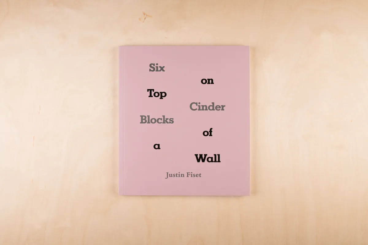 Six Cinder Blocks on Top of a Wall