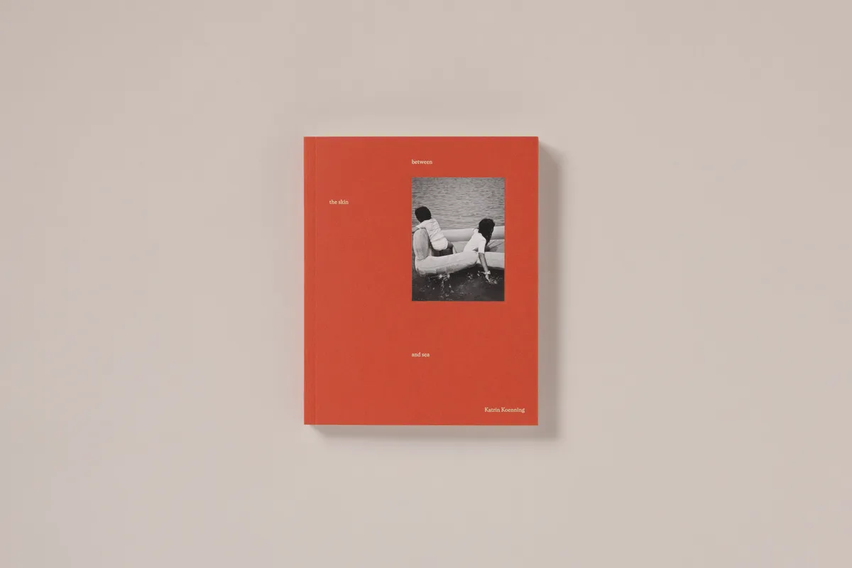 between the skin and sea